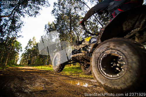 Image of Quad rider jumping