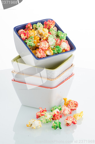 Image of Pile of ceramic bowls of popcorn