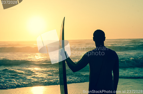 Image of Surfer watching the waves