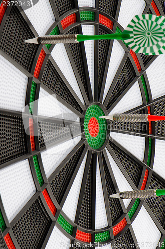 Image of Dart board with darts