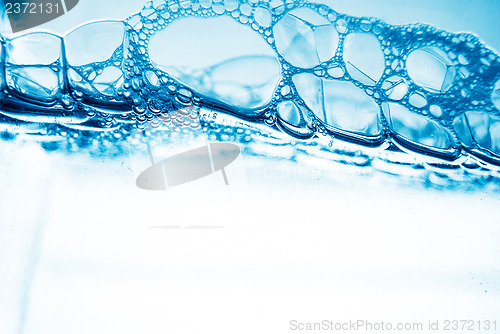 Image of Air bubbles in blue water