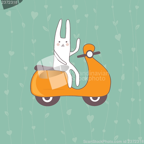 Image of Cute white rabbit on the orange scooter