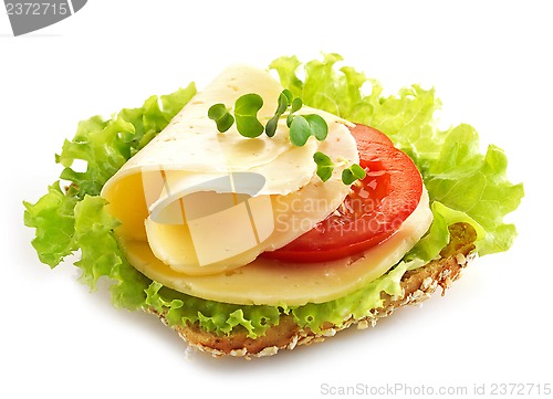 Image of bread with cheese and vegetables