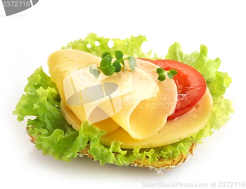 Image of bread with cheese and vegetables