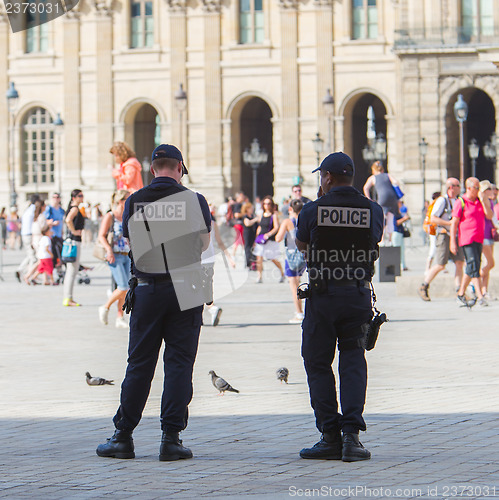 Image of PARIS, FRANCE - July 28 2013: French police control the street a