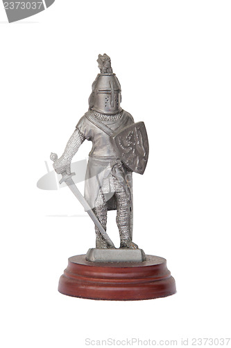 Image of Metal knight statuette isolated