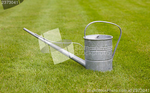 Image of Very old metal watering-can