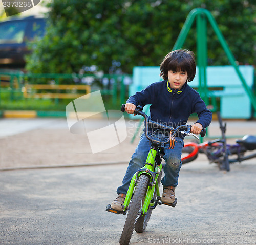 Image of boy on bike