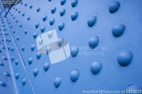 Image of rivets on the metal surface