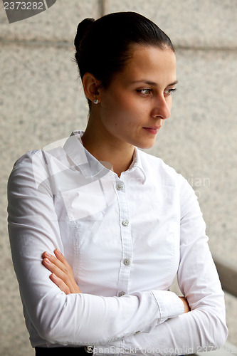Image of businesswoman in a white blouse