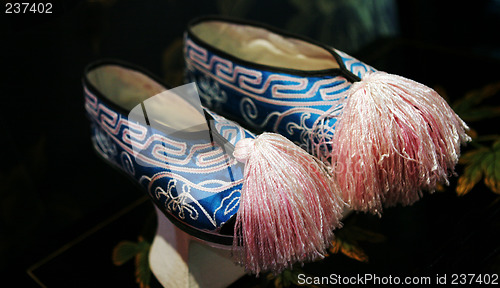 Image of Blue and pink Asian traditional shoes