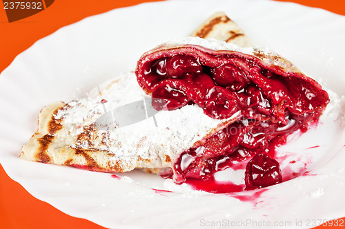 Image of pancakes with cherries