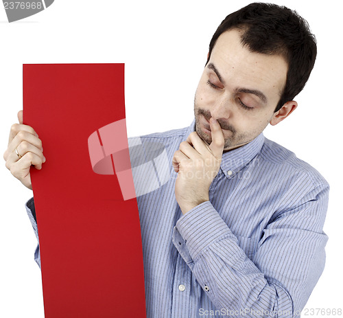 Image of Man holding a paper