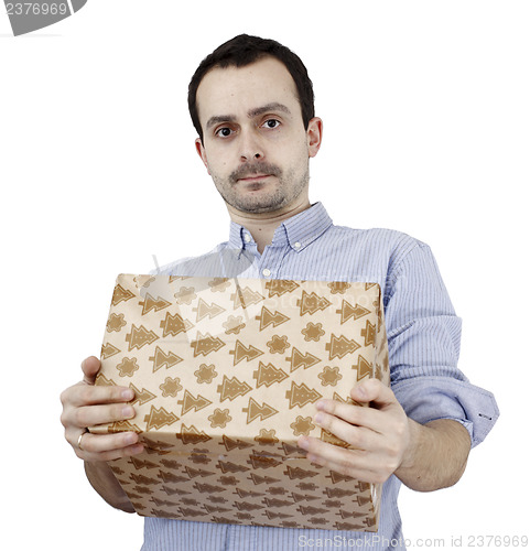 Image of Young man holding a present