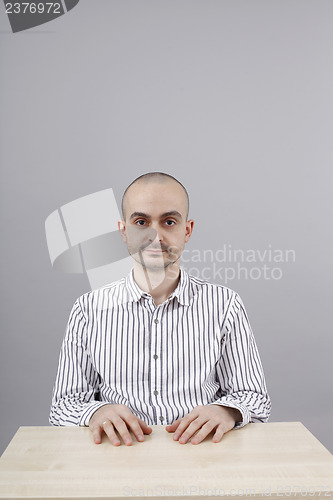 Image of Man at desk