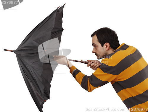 Image of Man with umbrella