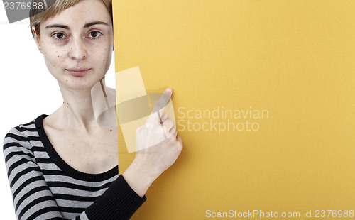 Image of Woman holding a paper