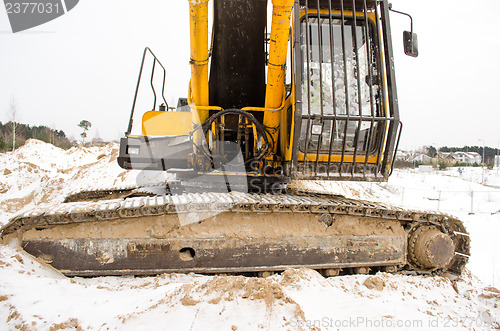 Image of caterpillar excavator tractor cabin snow winter 