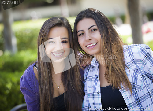 Image of Two Mixed Race Female Friends Portrait