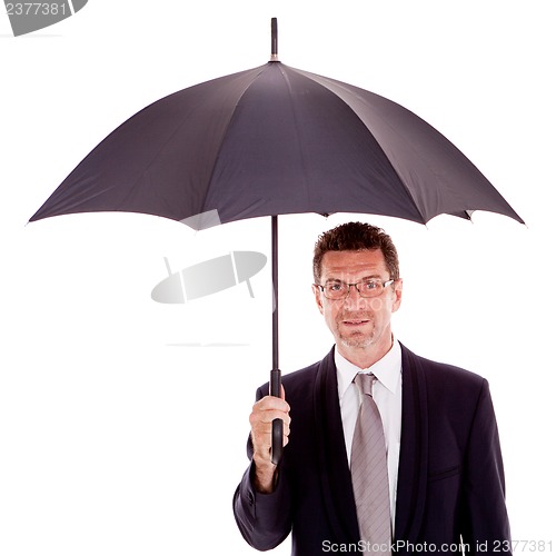 Image of mature attractive business man with umbrella isolated