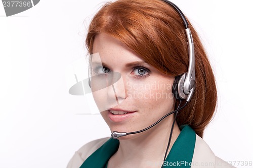 Image of smiling business woman callcenter agent operator isolated portrait