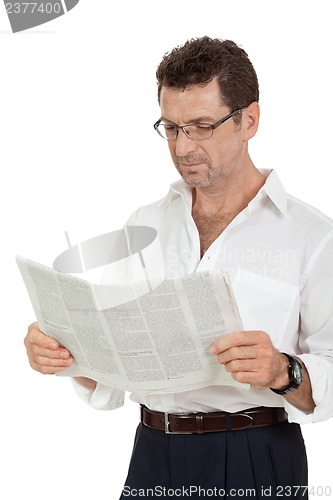 Image of attractive adult businessman reading newspaper isolated