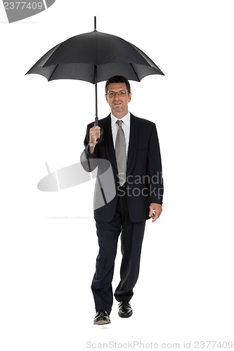 Image of mature attractive business man with umbrella isolated