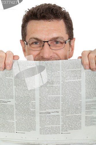 Image of attractive adult businessman reading newspaper isolated