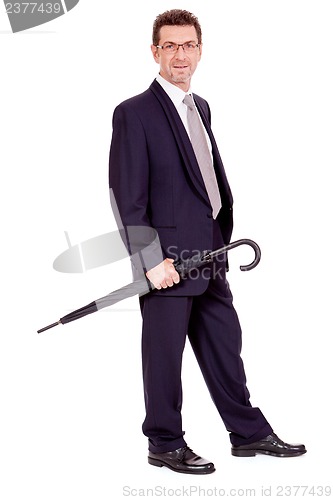 Image of mature attractive business man with umbrella isolated