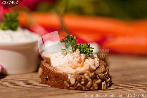 Image of fresh tasty homemade cream cheese and herbs with bread