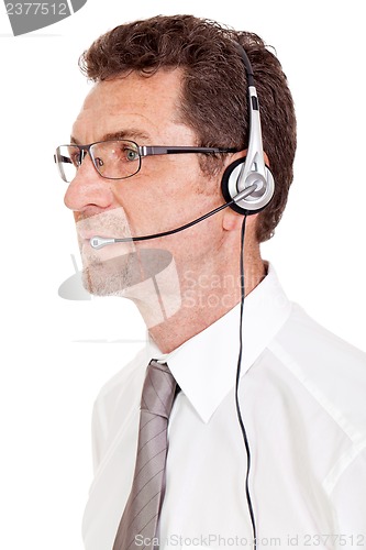 Image of smiling mature male operator businessman with headset call senter