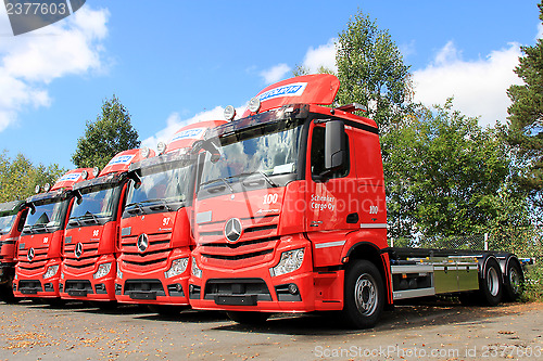 Image of Row of Red Mercedes-Benz Actros Trucks