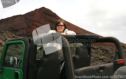 Image of Woman in jeep