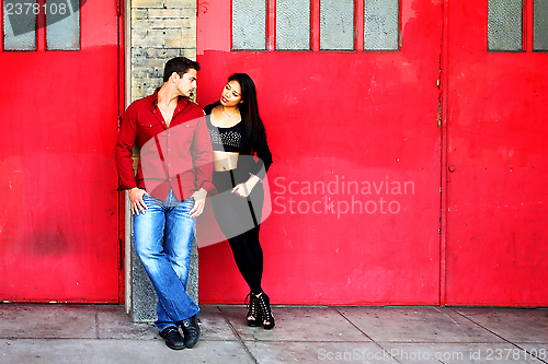 Image of Young Couple Red Doors