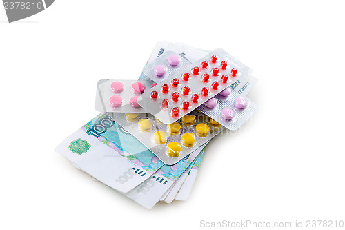 Image of Pills and money