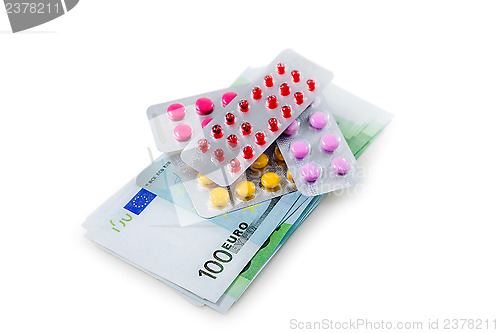 Image of Pills and money