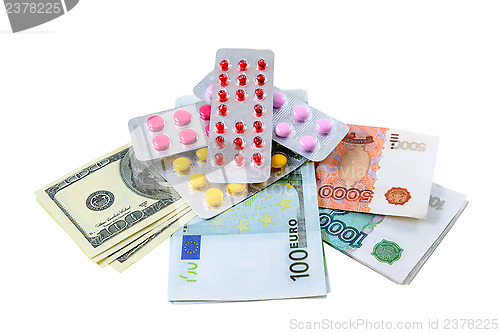 Image of Pills and money