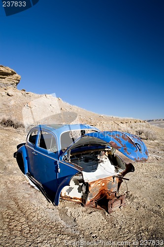 Image of abandoned blue car