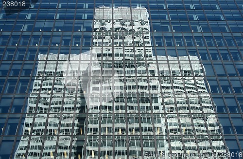 Image of Reflection of a white office building