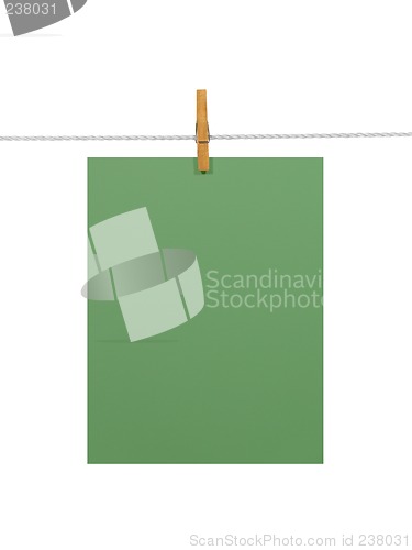 Image of Green paper sheet on a clothes line (+2 clipping paths)