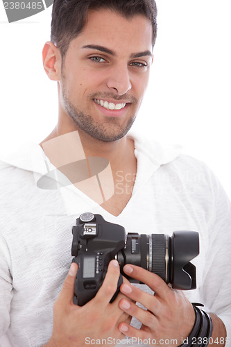 Image of Smiling man with a digital camera