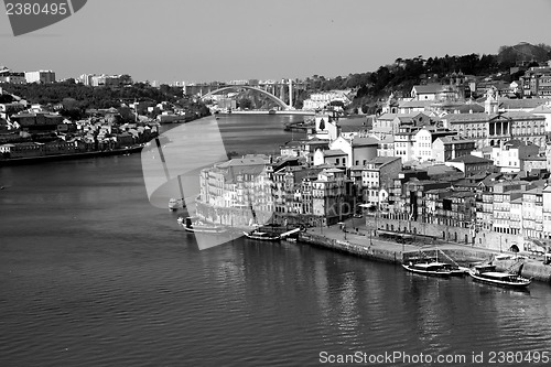 Image of Portugal. Porto city. View of Douro river embankment  in black a