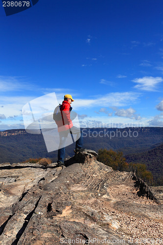 Image of Hiker admiring mountain views