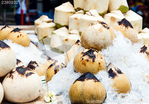 Image of Young coconut on food stall