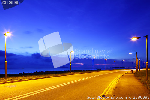 Image of Empty asphalt road at night