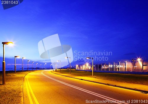 Image of Empty asphalt road at night