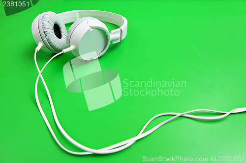 Image of Headphone on green background