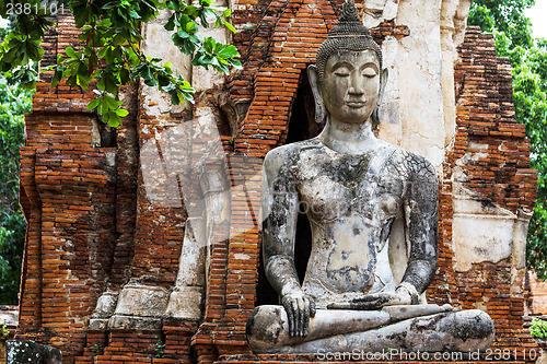 Image of Ancient temple with ruins buddha