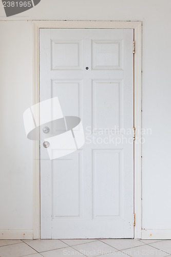 Image of Old white door