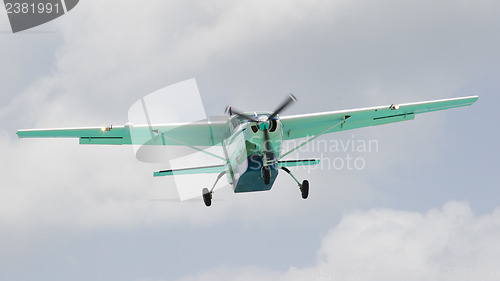 Image of Small plane descending 